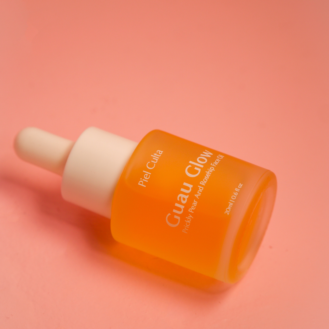 “Guau Glow facial oil against a pink backdrop”